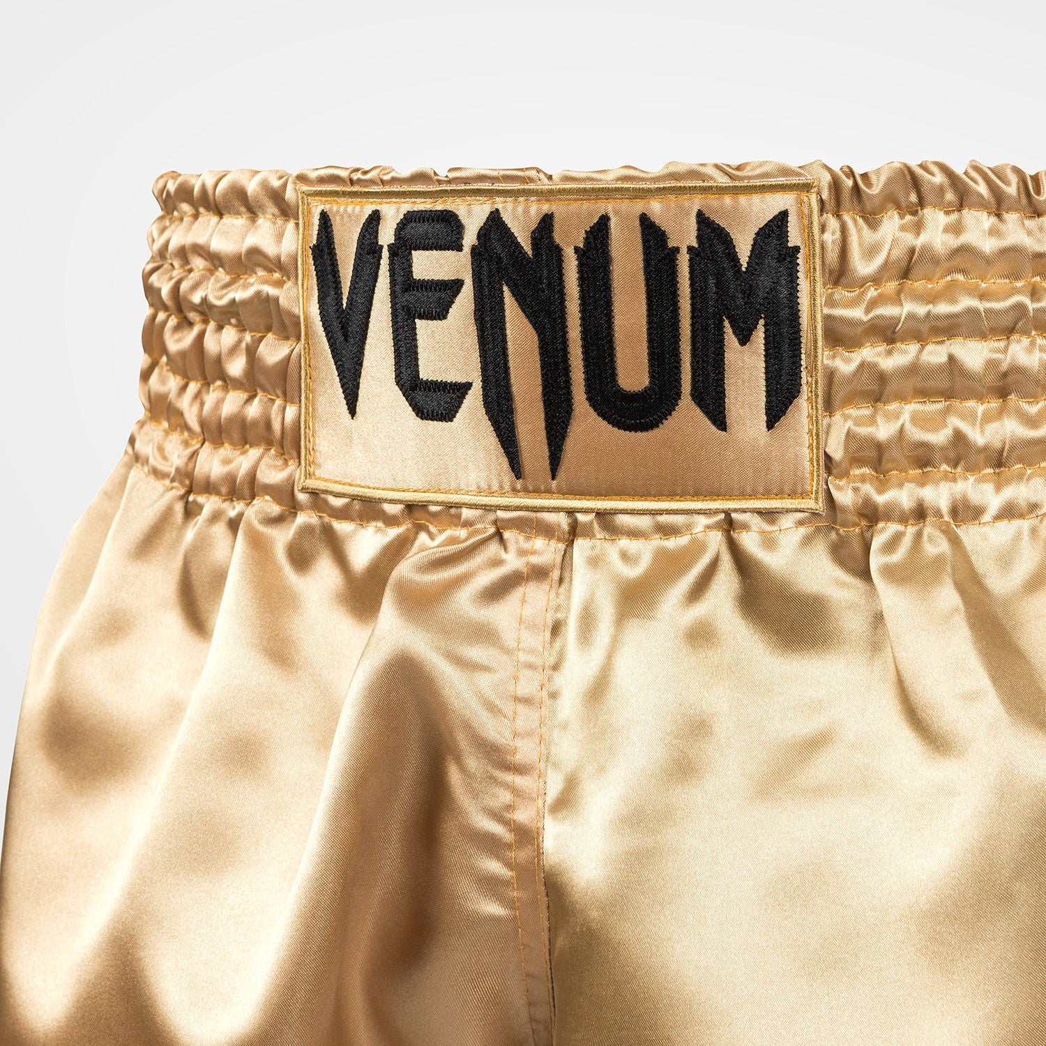 Venum Muay Thai Classic Gold/Black hlačke za tajski boks
