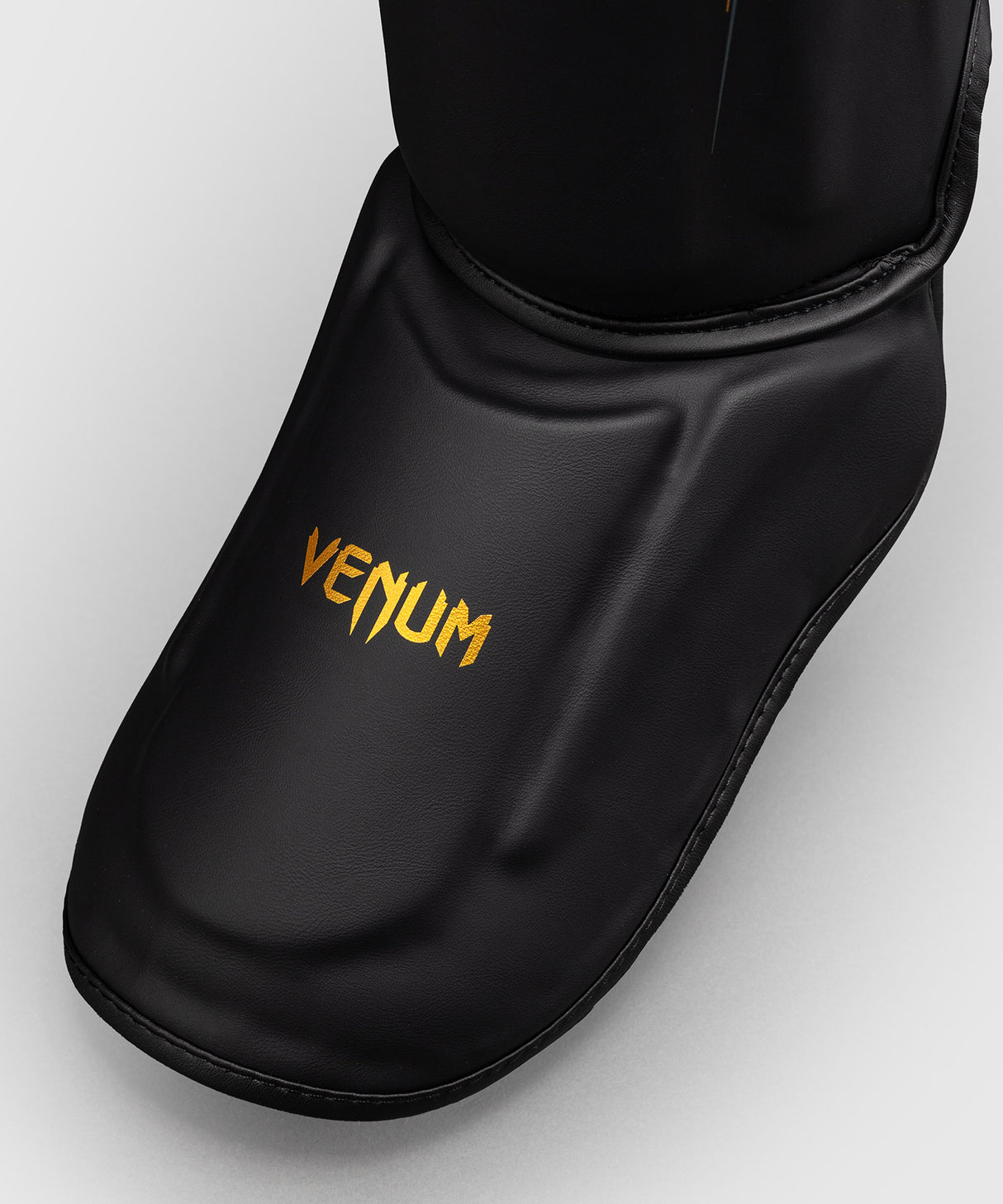 Venum Streamline Shin Guards - Black/Gold
